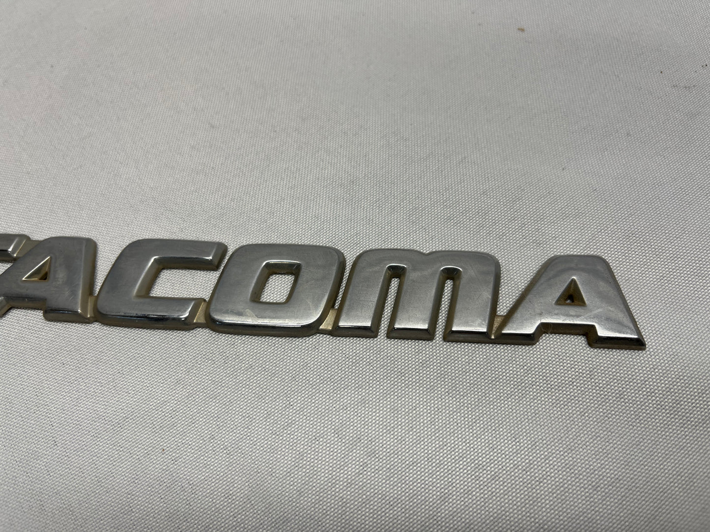 Used OEM Toyota Tacoma Emblem - Chrome - Toyota Tacoma - 1995.5-2004